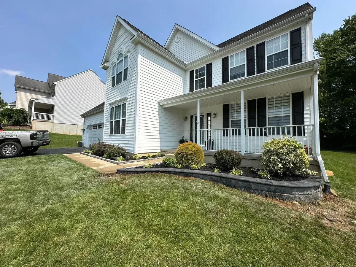 Front yard retaining wall and landscape beds with Keystone truck Chester County PA