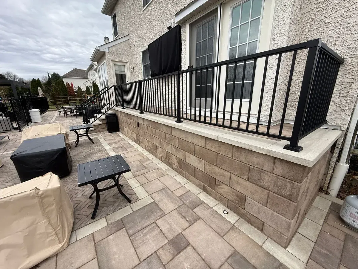 Paver patio steps with aluminum railing and LED lights Chester County PA